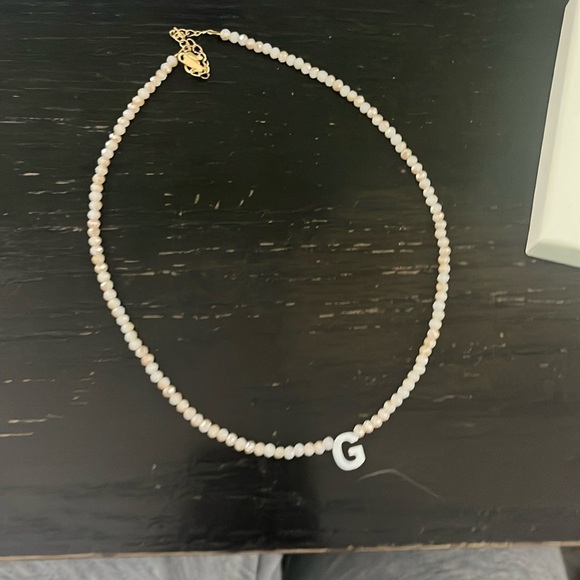 “G” initial necklace. Small white/beige beads with white initial. - Picture 1 of 3